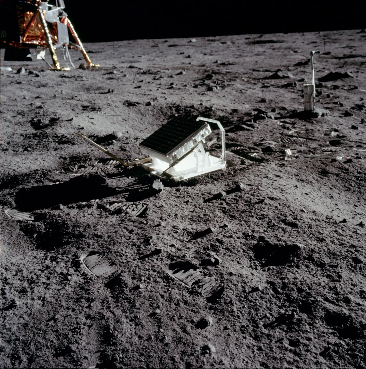 The Apollo 11 laser ranging retroreflector on the lunar surface, a tilted panel of corner-cube mirrors set down near the lunar module as a target for laser pulses fired from Earth